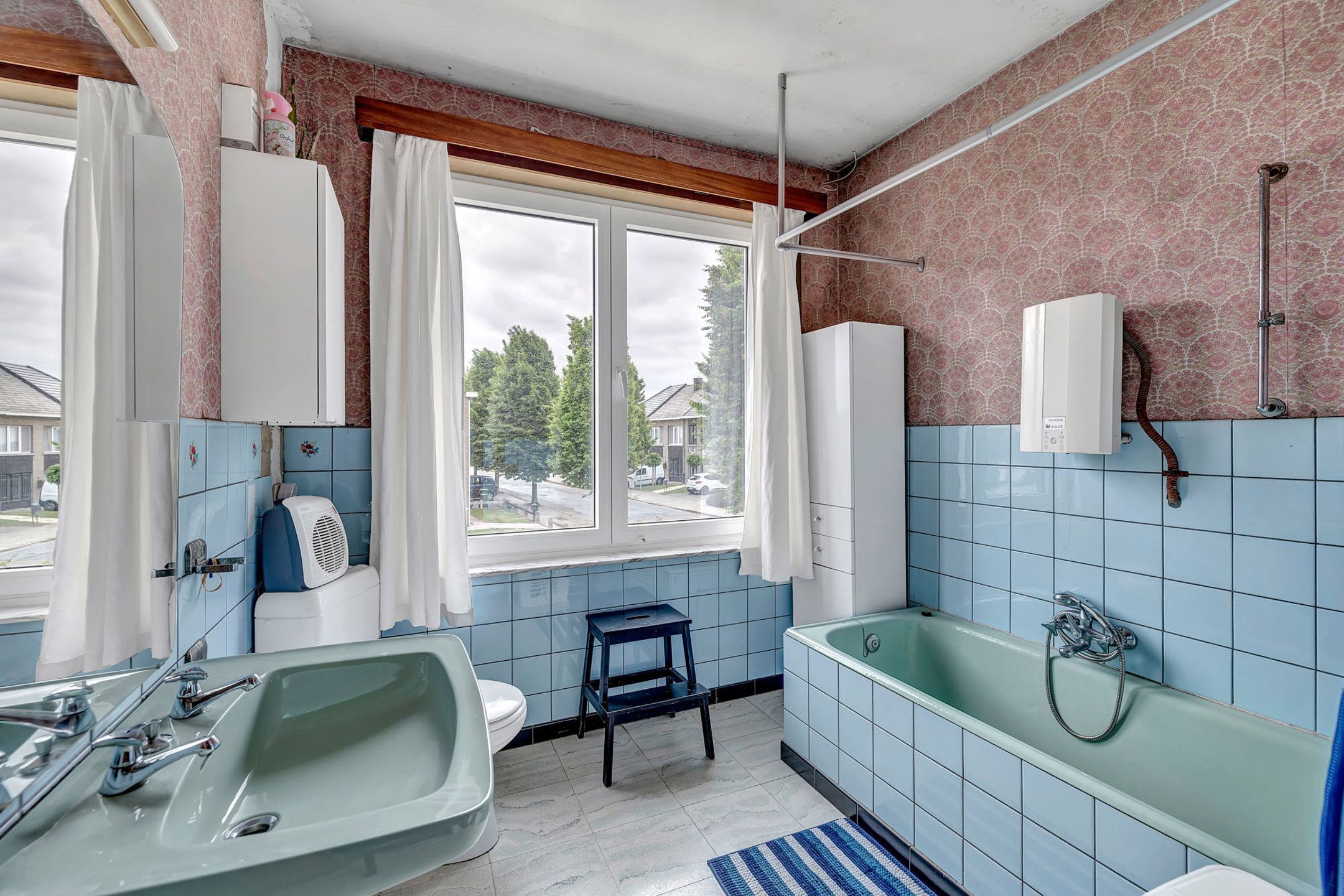 Te renoveren woning met drie slaapkamers en garage foto 14
