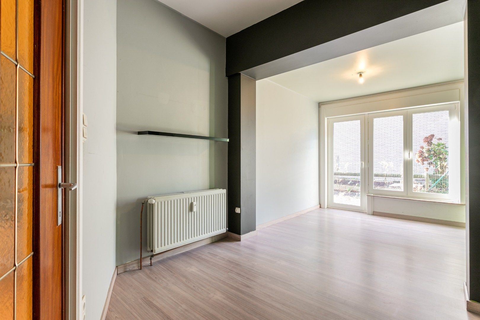 Ruim gelijkvloersapp te koop centrum Halle met 1 à 2 slpk, garage en tuin foto 11