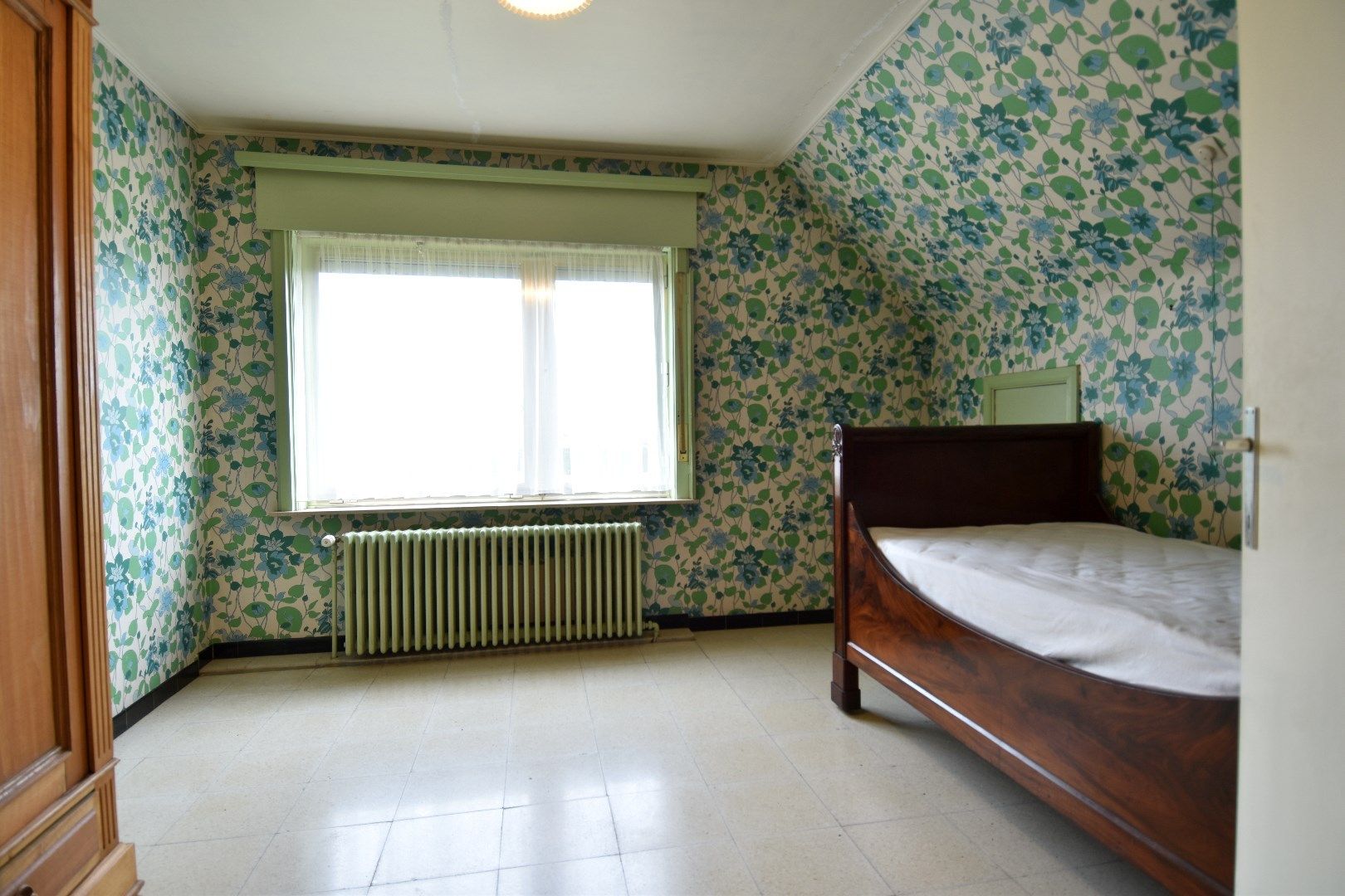 Gezinswoning op een perceel van 1244 m² met 4 slaapkamers, zonnige tuin en dubbele garage te koop in Ooigem/Wielsbeke foto 10