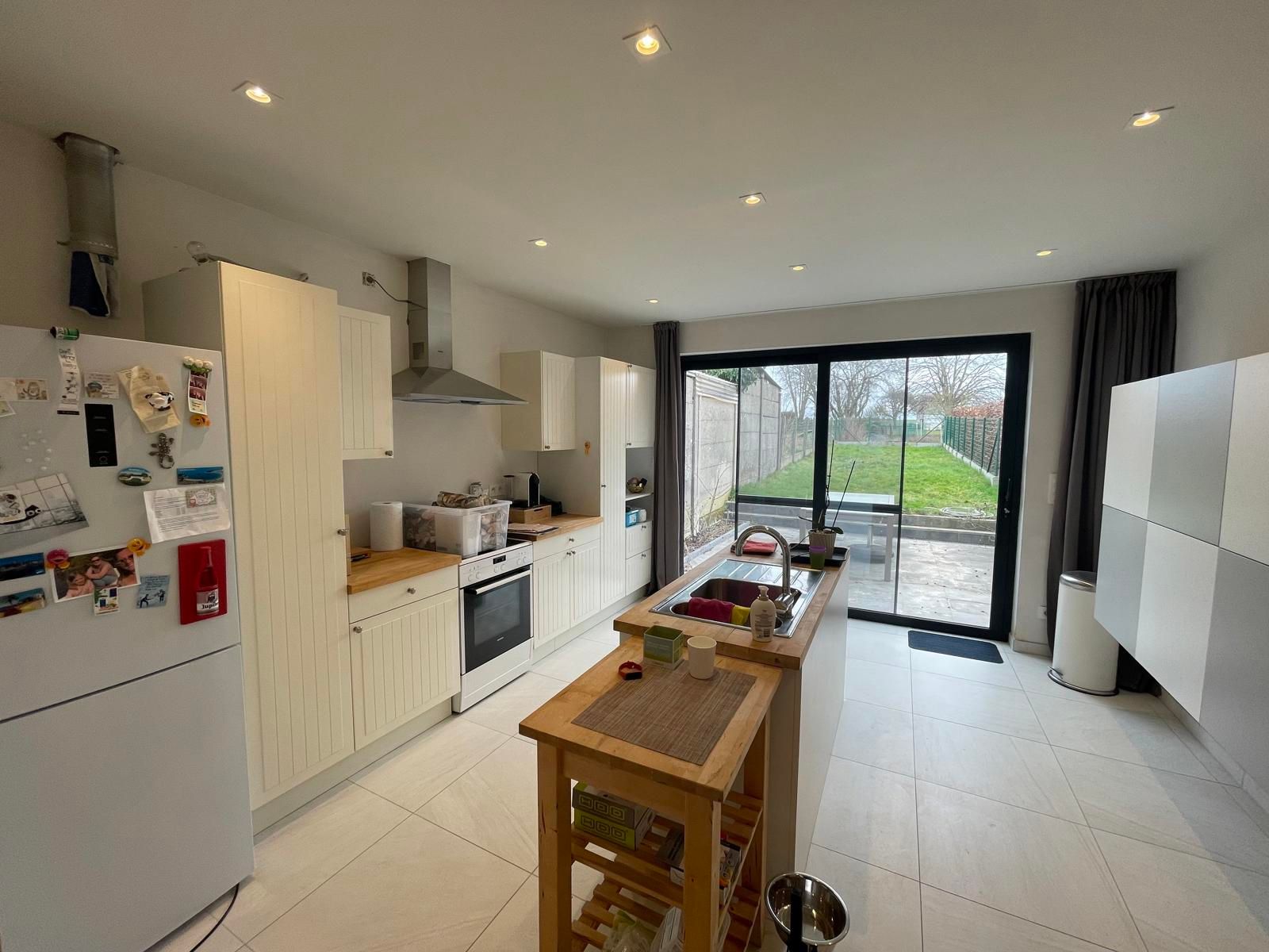 OORDEGEM - Gerenoveerde rijwoning met tuin. foto 7