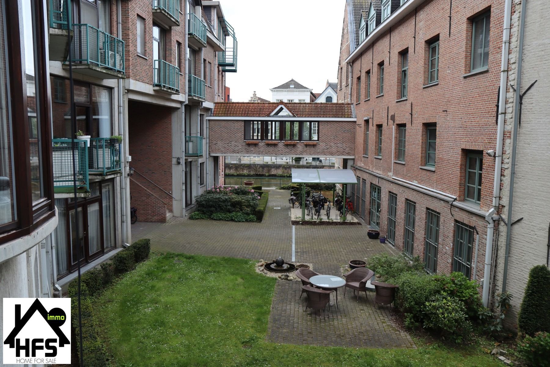 Interessante investering! Erk. assistentiewoning met ond gr garage in binnenstad! foto 10