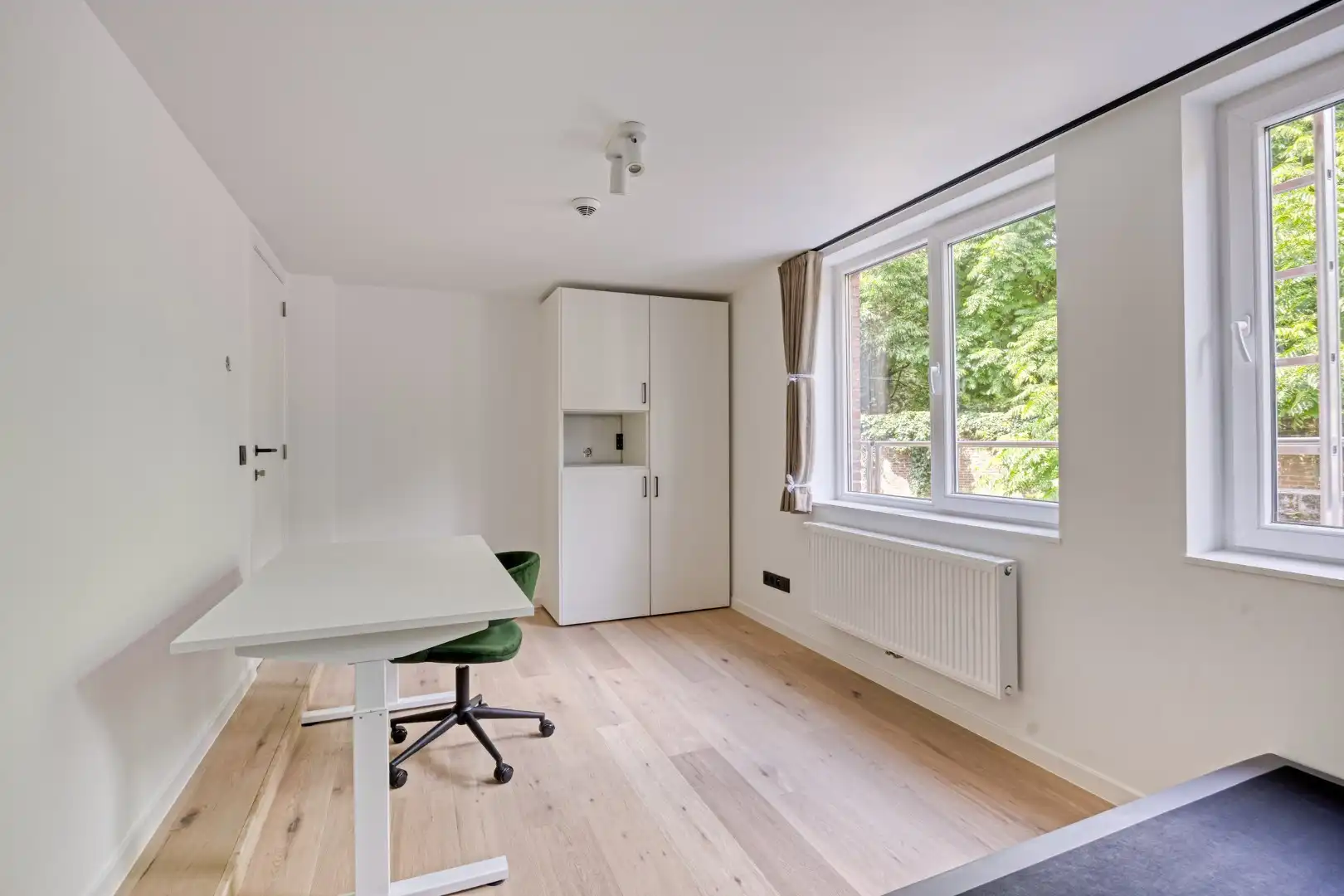 Volledig gerenoveerde studentenkamer in residentie met 29 studentenkamers met eigen sanitair en terras in hartje Leuven - EPC label A! foto 2