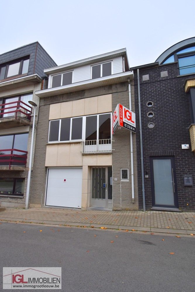 Goed gelegen rijwoning met 3 slaapkamers, tuin en garage foto 2