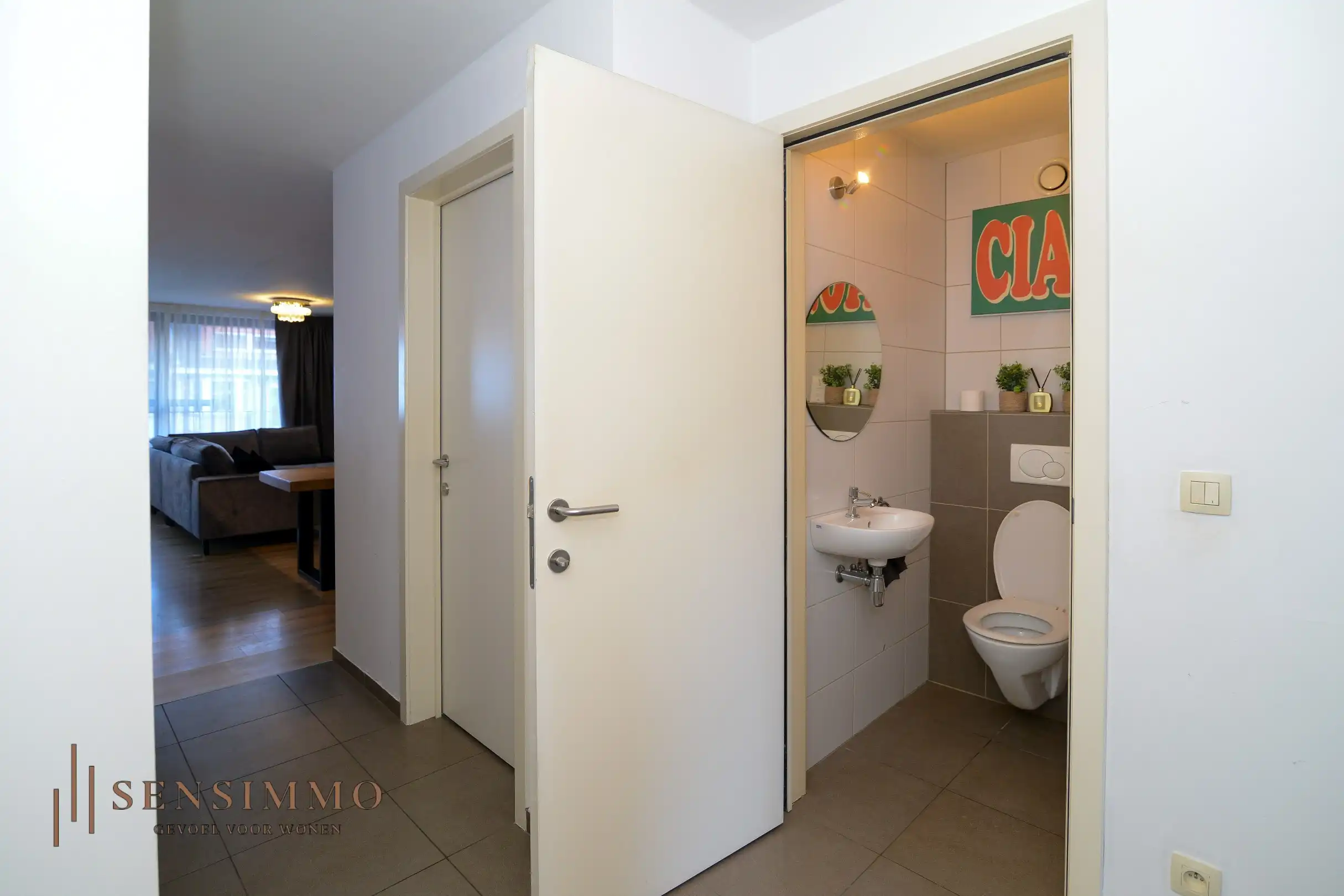 Instapklaar 2-slaapkamerappartement met dubbele terrassen en garagebox in hartje Eisden foto 11