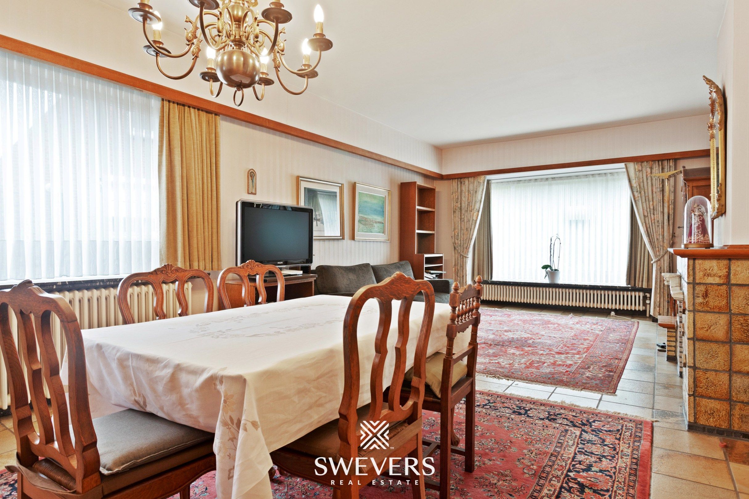 Open bebouwing met 4 slaapkamers, kelder en tuin in rustige, doodlopende straat foto 6