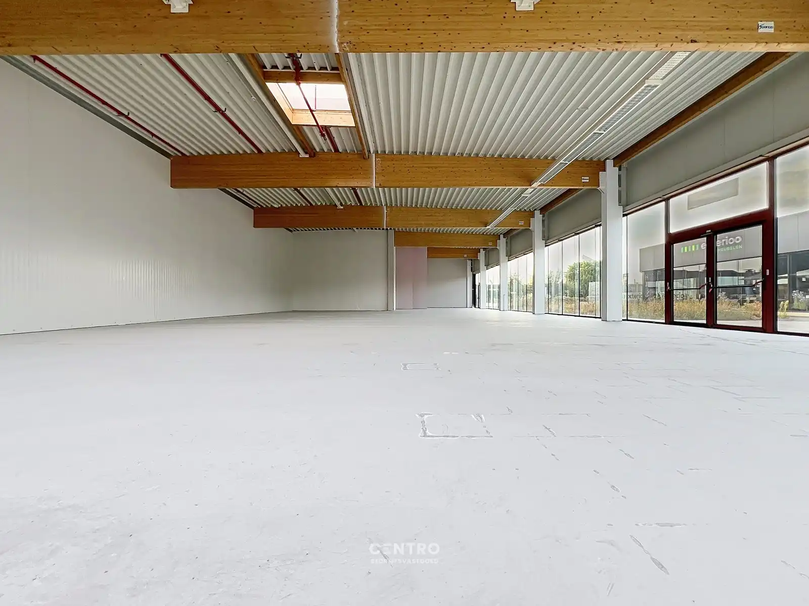 Vernieuwde baanwinkel (450m²) te huur in hét bruisende MAMMOETCENTER van Roeselare ! foto 9