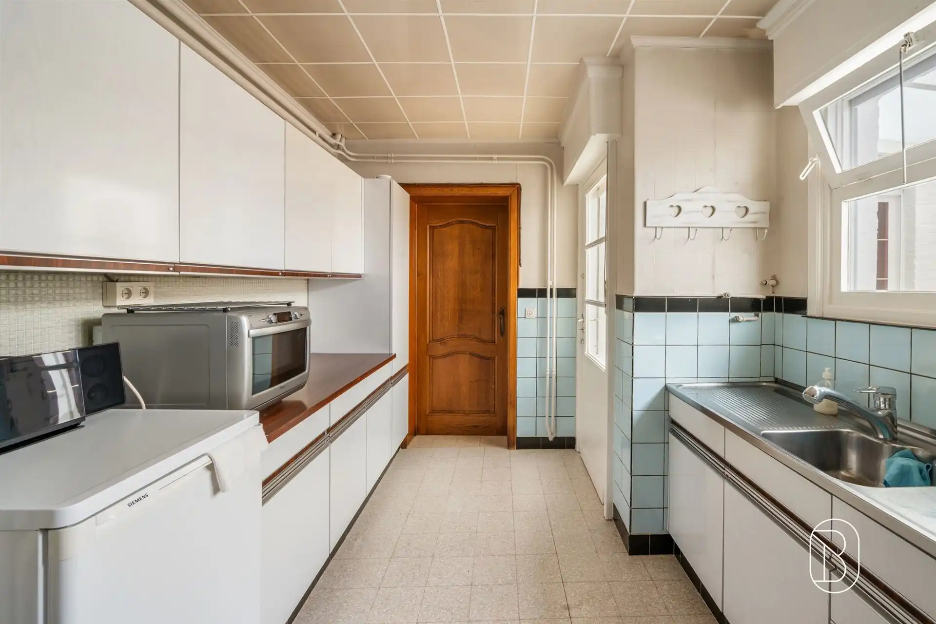 Degelijke woning met veel potentieel & aangename tuin  foto 12