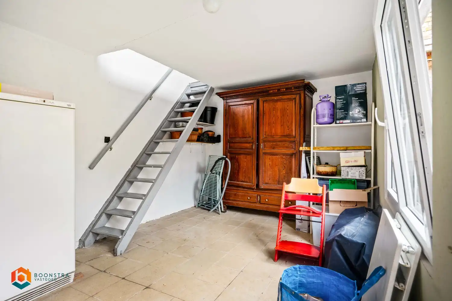 Instapklare woning met 4 slpkrs met gezellige stadstuin en garage foto 19