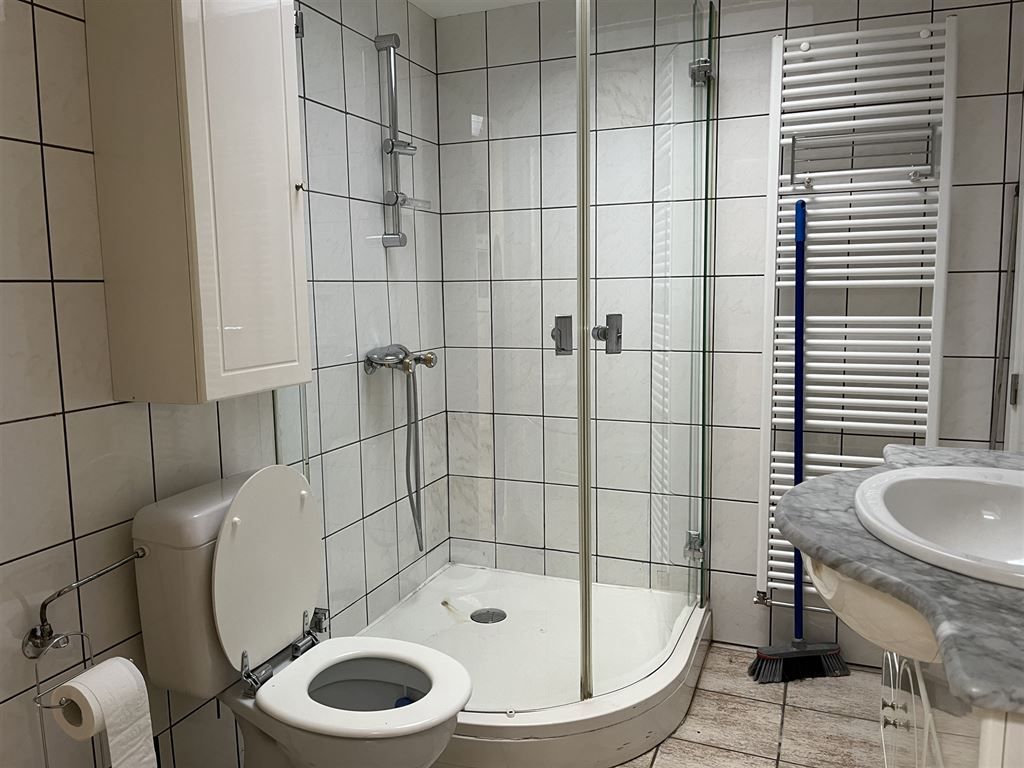 Gezellig en instapklaar triplex appartement met 2 slaapkamers in het centrum van Opoeteren foto 7