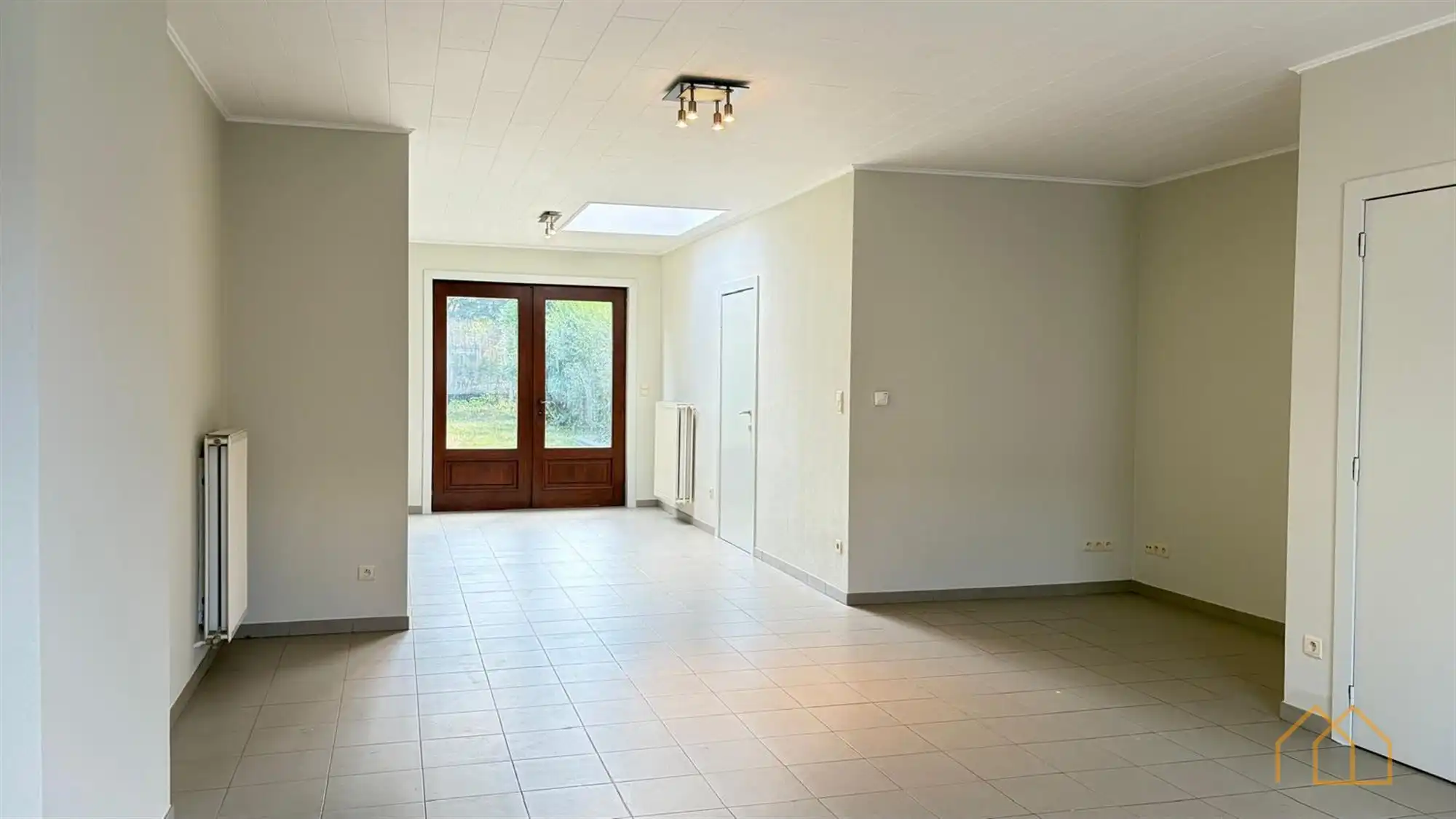 Gerenoveerde rijwoning met tuin foto 7