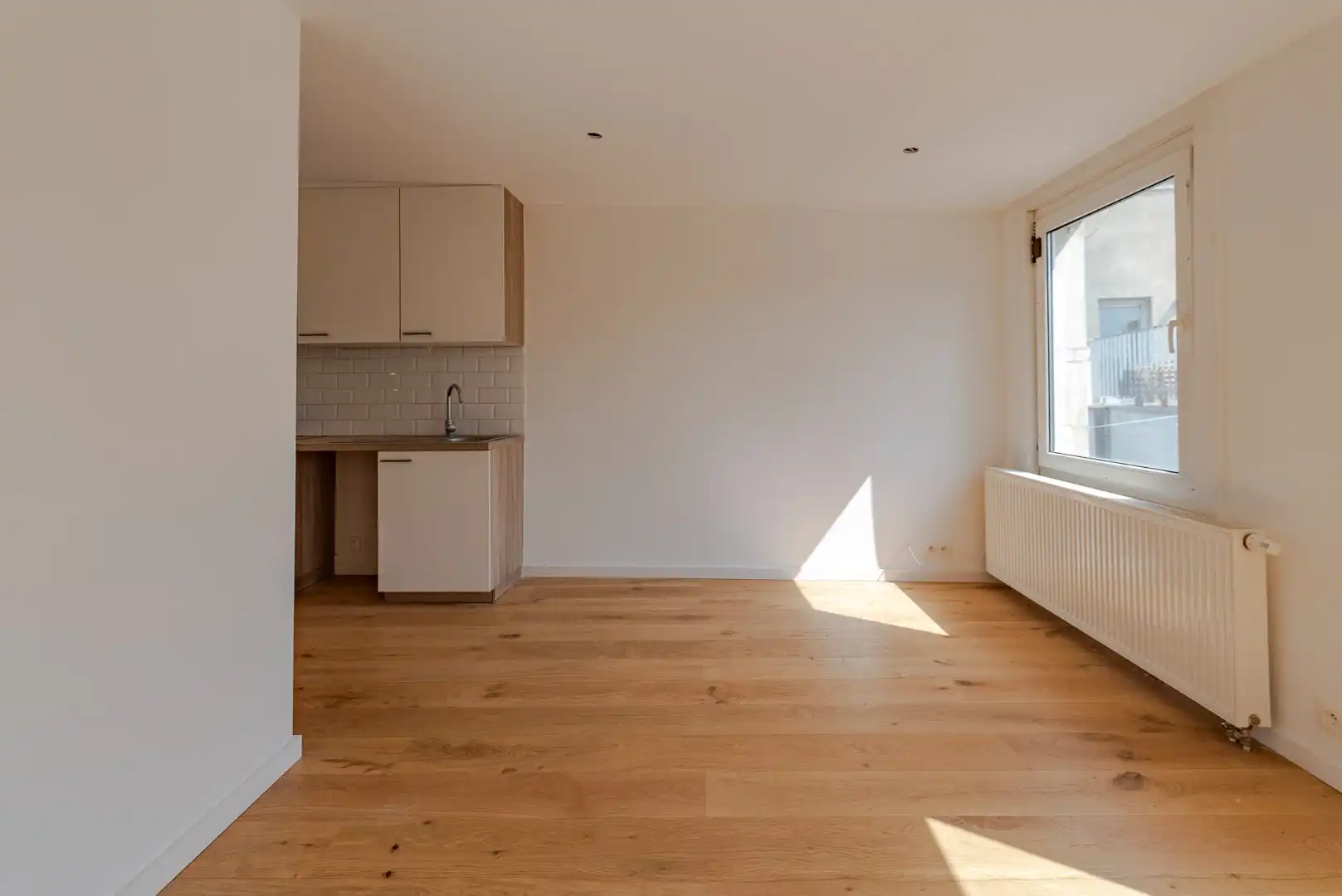 Gerenoveerd appartement met terras, op topligging foto 4