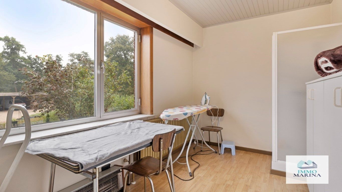 Woning met W-tuin circa 41a en volledige kelder. foto 19