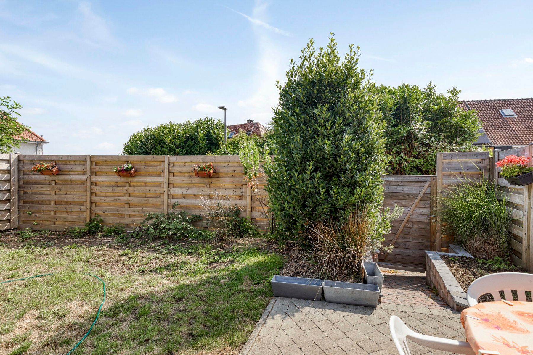 Instapklare woning met zonnige tuin in een rustige buurt! foto 23