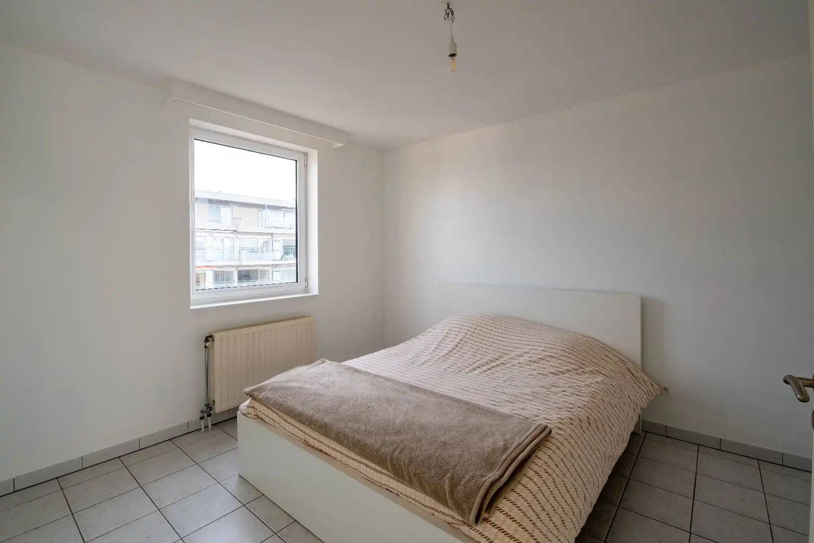 Lichtrijk appartement met mooi uitzicht, terras en garagebox foto 11