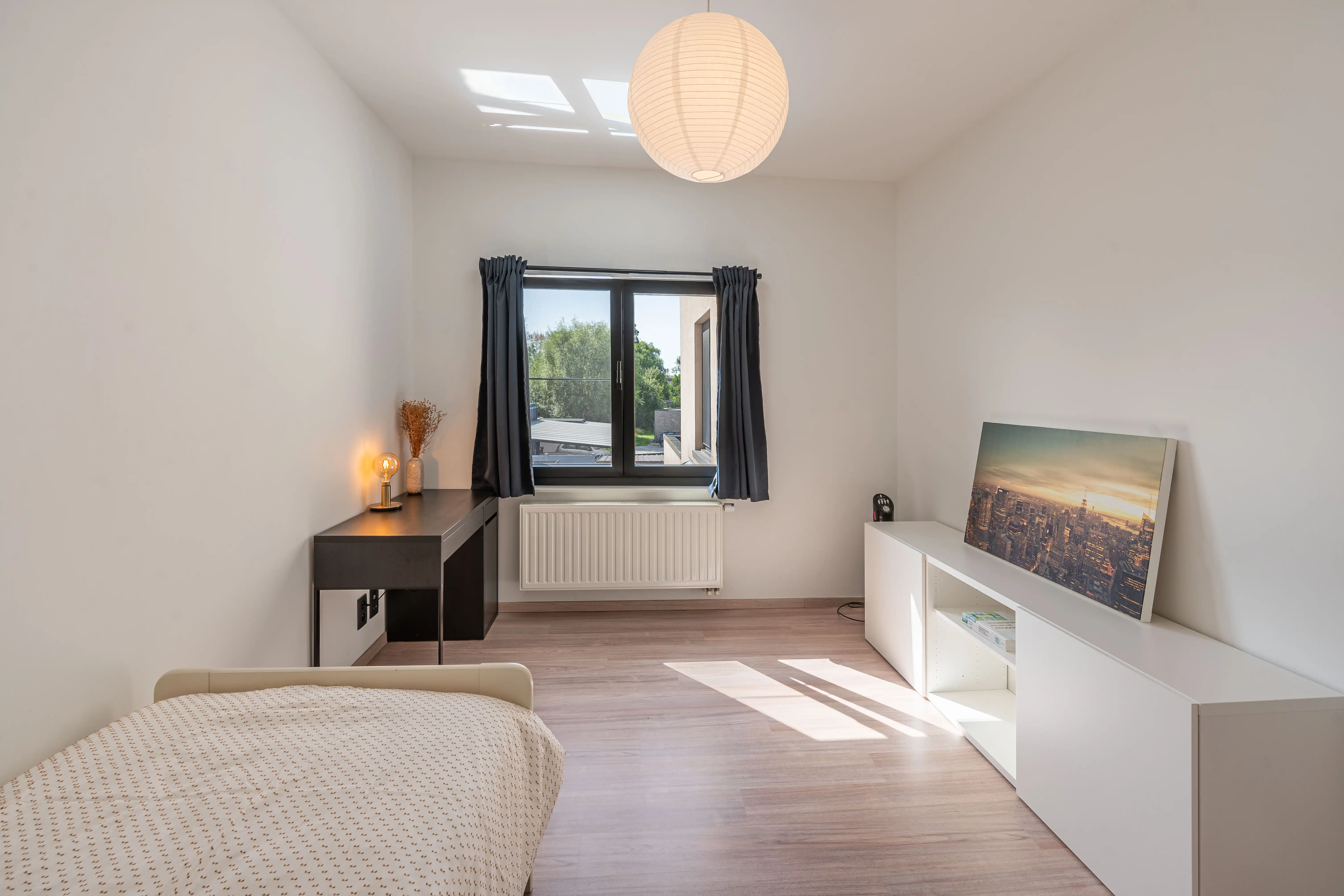 Instapklare en verrassend ruime woning in hartje Willebroek foto 11