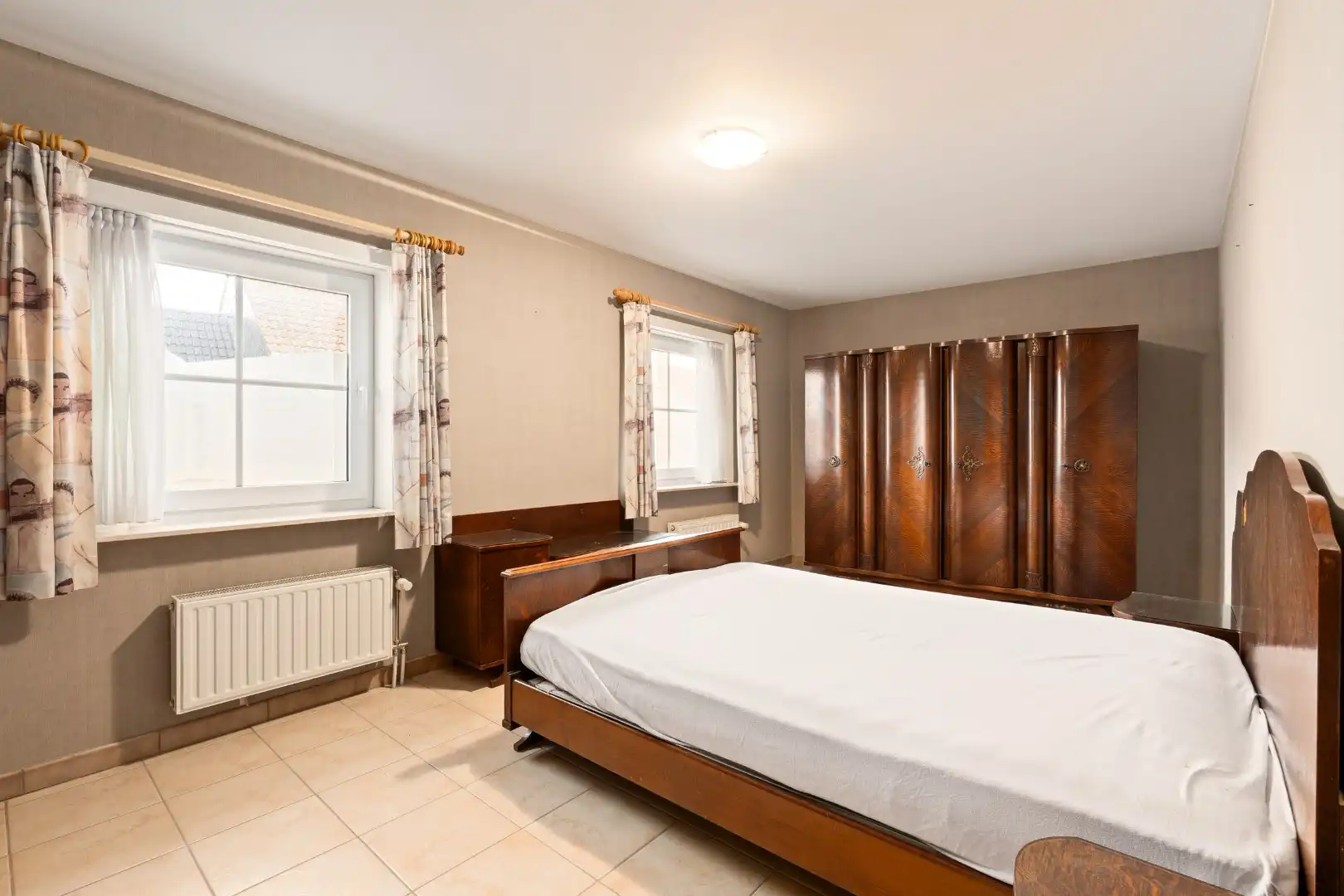 Te koop in Bredene: ruime instapklare halfopen bebouwing met 4 slaapkamers, grote tuin en multifunctioneel bijgebouw op 848 m² foto 14