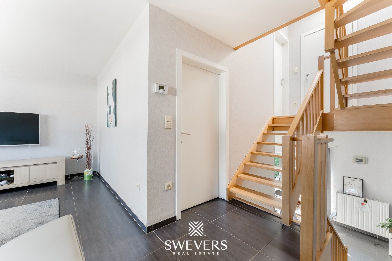Energiezuinige en instapklare rijwoning met 3 slaapkamers en leuke tuin in hartje Koersel foto 9