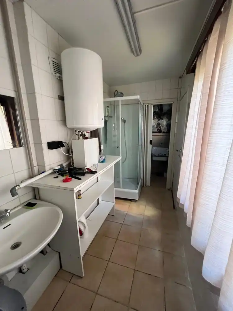 Rijwoning opgesplitst in twee appartementen foto 8