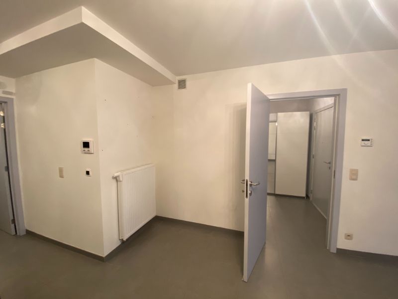 Gelijkvloers appartement met voor- en achtertuin en garage foto 5