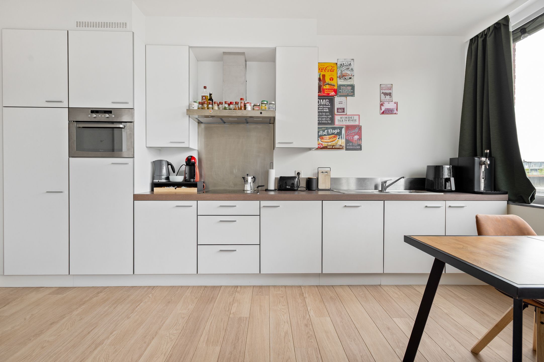 Hip éénslaapkamer appartement mét garage en kelderberging te huur! foto 2