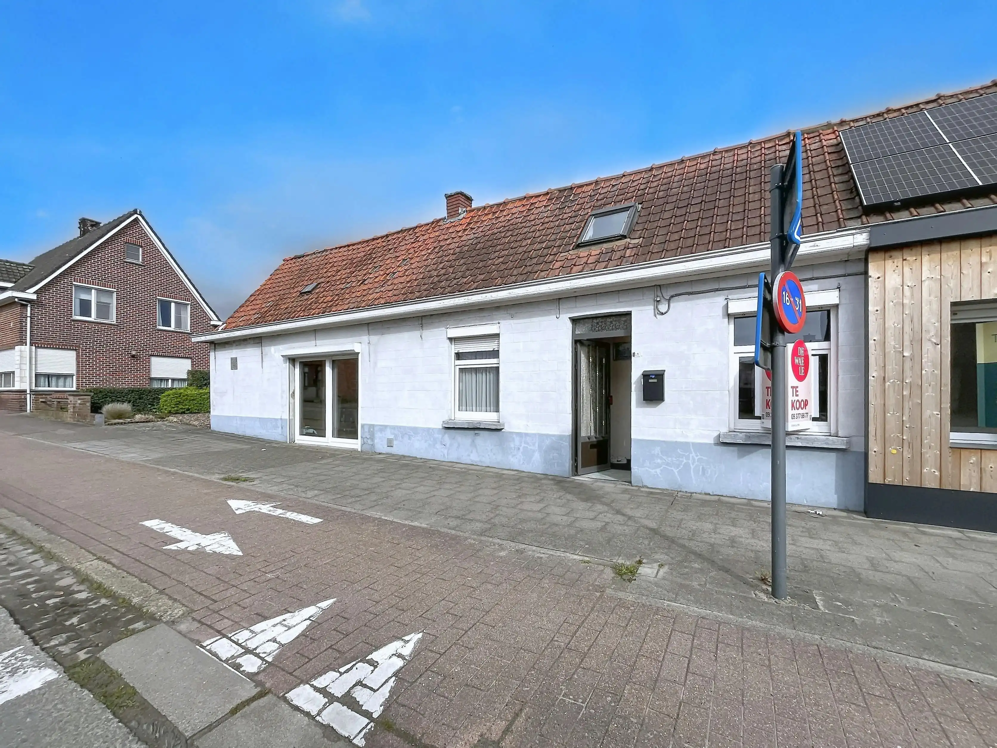 Te renoveren woning in het centrum van Ursel foto 14
