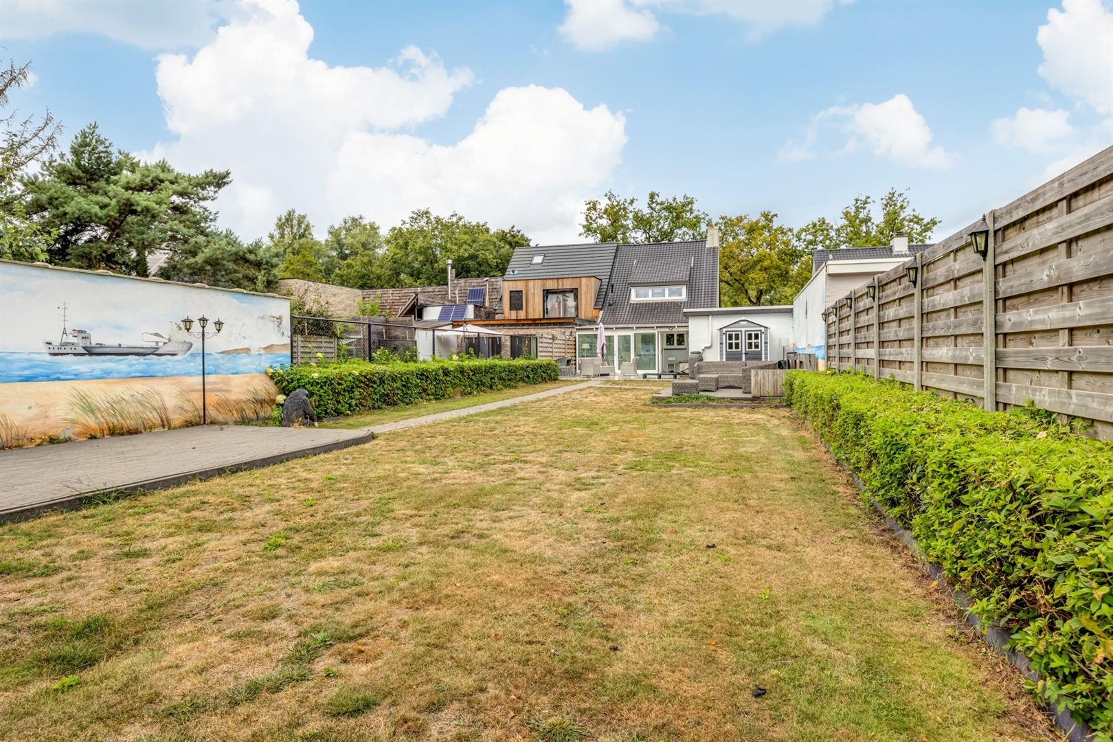 Instapklare halfopen woning met zonnige tuin aan de Vaart Schoten foto 21