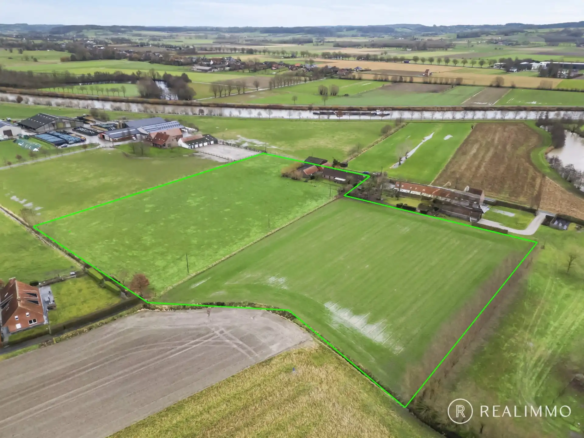 Hoofdfoto van de publicatie: Uniek gelegen eigendom op 2,47 hectare aan de oevers van de Schelde in Kerkhove