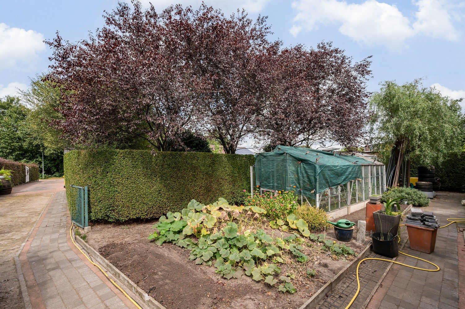 Ruime gezinswoning op breed en groot perceel van 1122m² foto 40