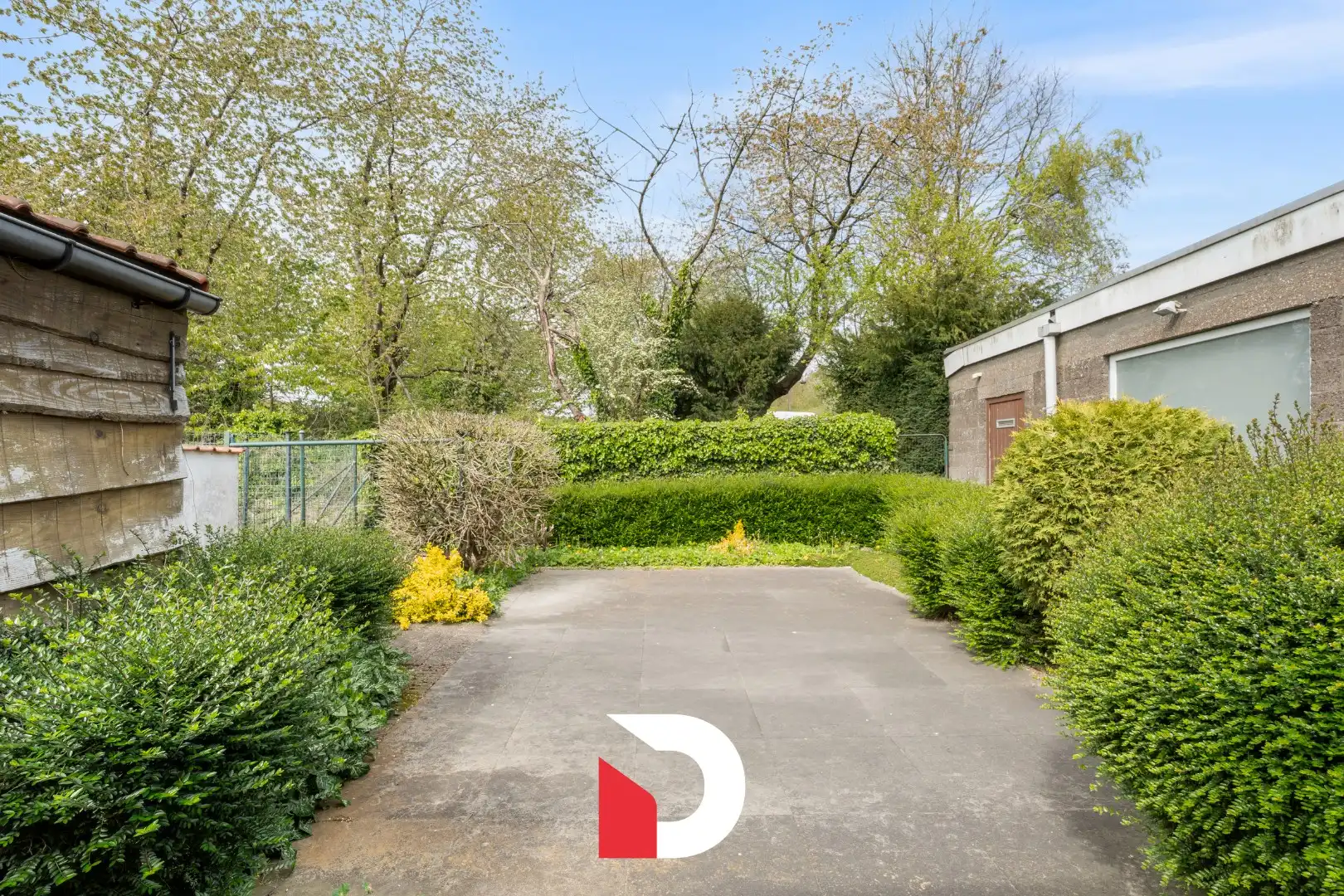 Hoofdfoto van de publicatie: Polyvalente woning met tuin en atelierruimte