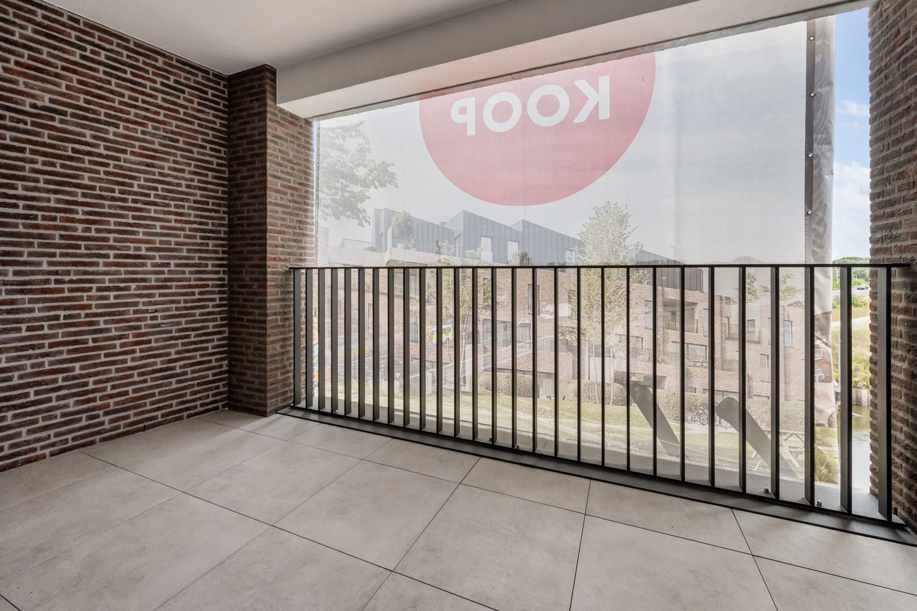 Nieuwbouwappartement met 2 slpks + 2 terrassen foto 4