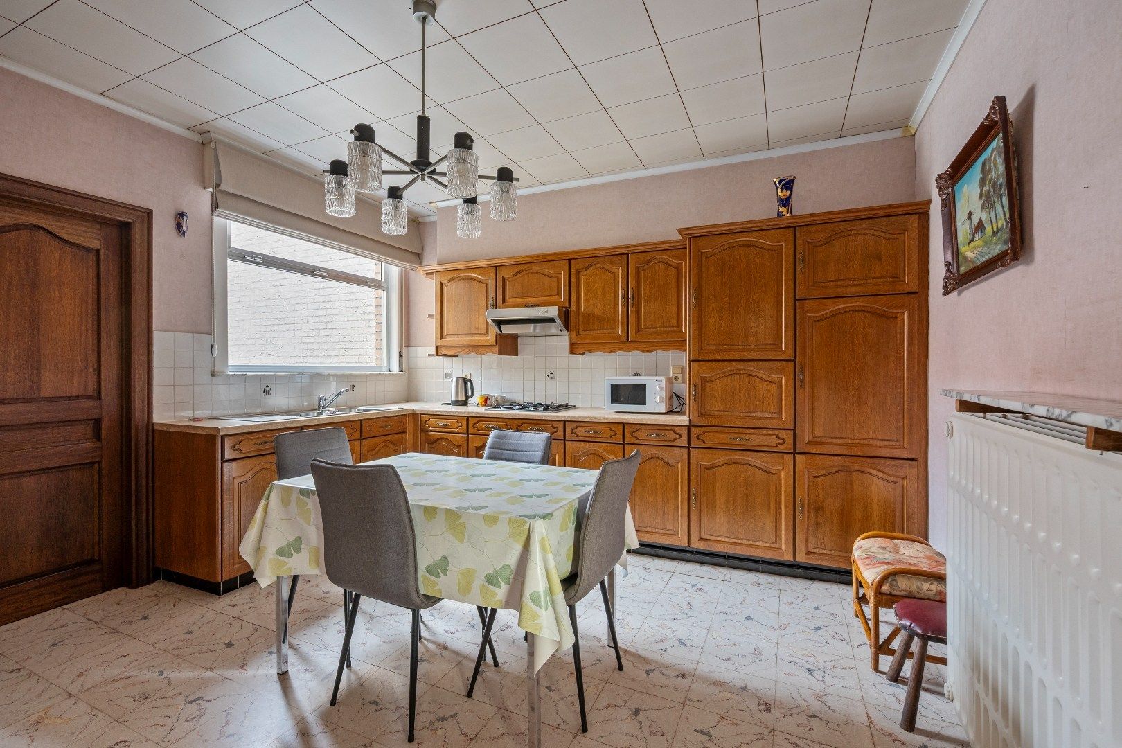 Op te frissen woning met 3 slaapkamers, garage en tuin. foto 5