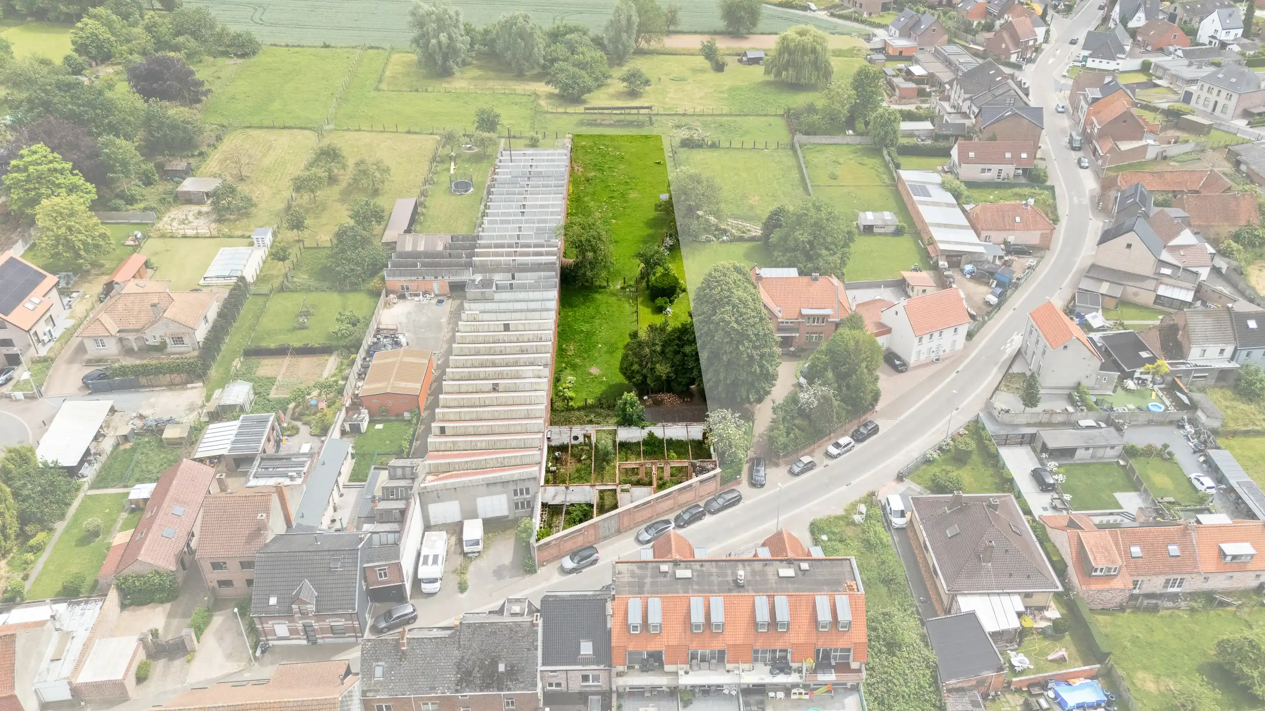Topgelegen bouwgrond in Erpe-Mere met tal van opties! foto {{pictureIndex}}