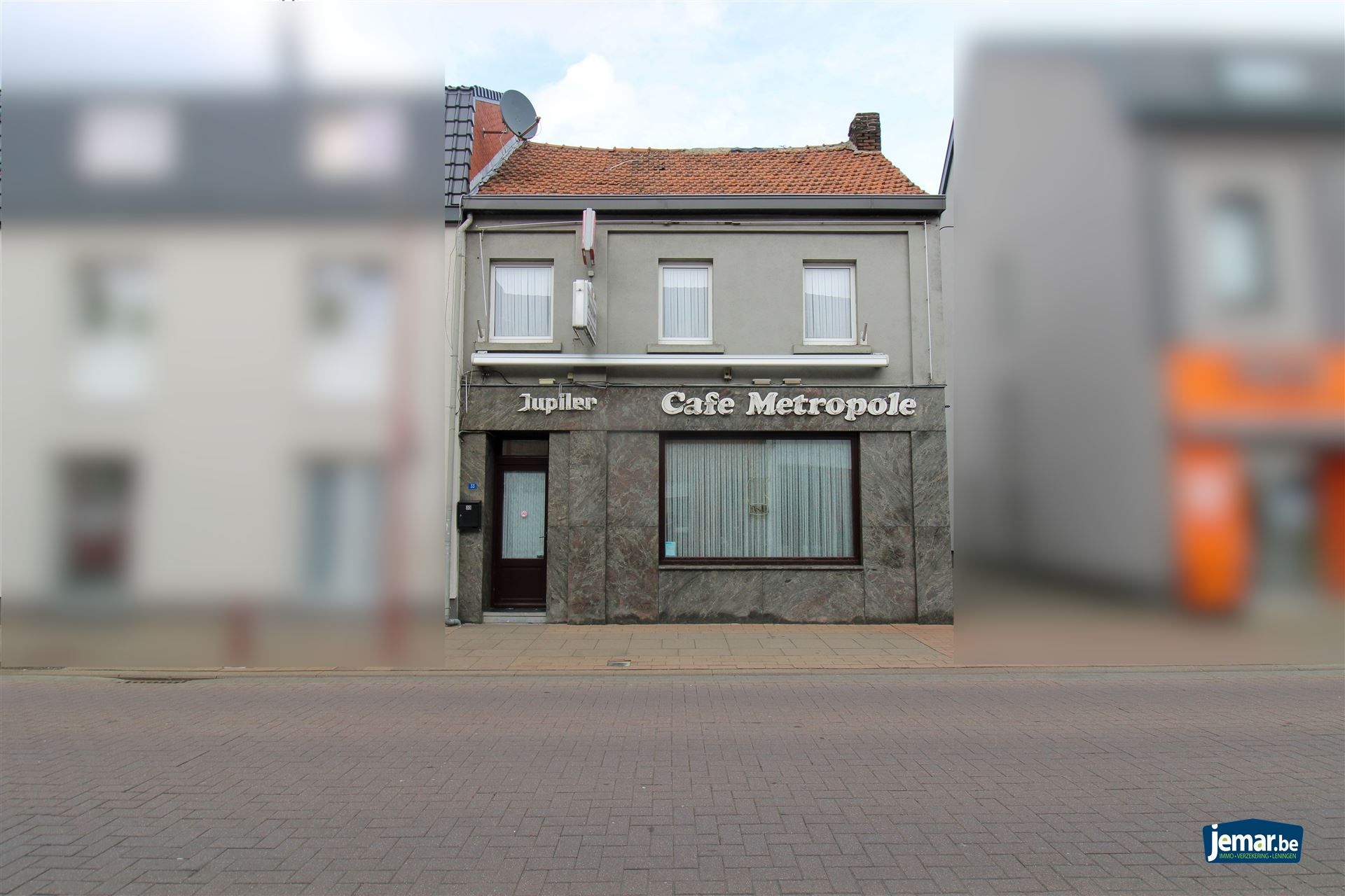 Handelspand met woonst te koop gelegen op toplocatie in Maasmechelen! foto {{pictureIndex}}