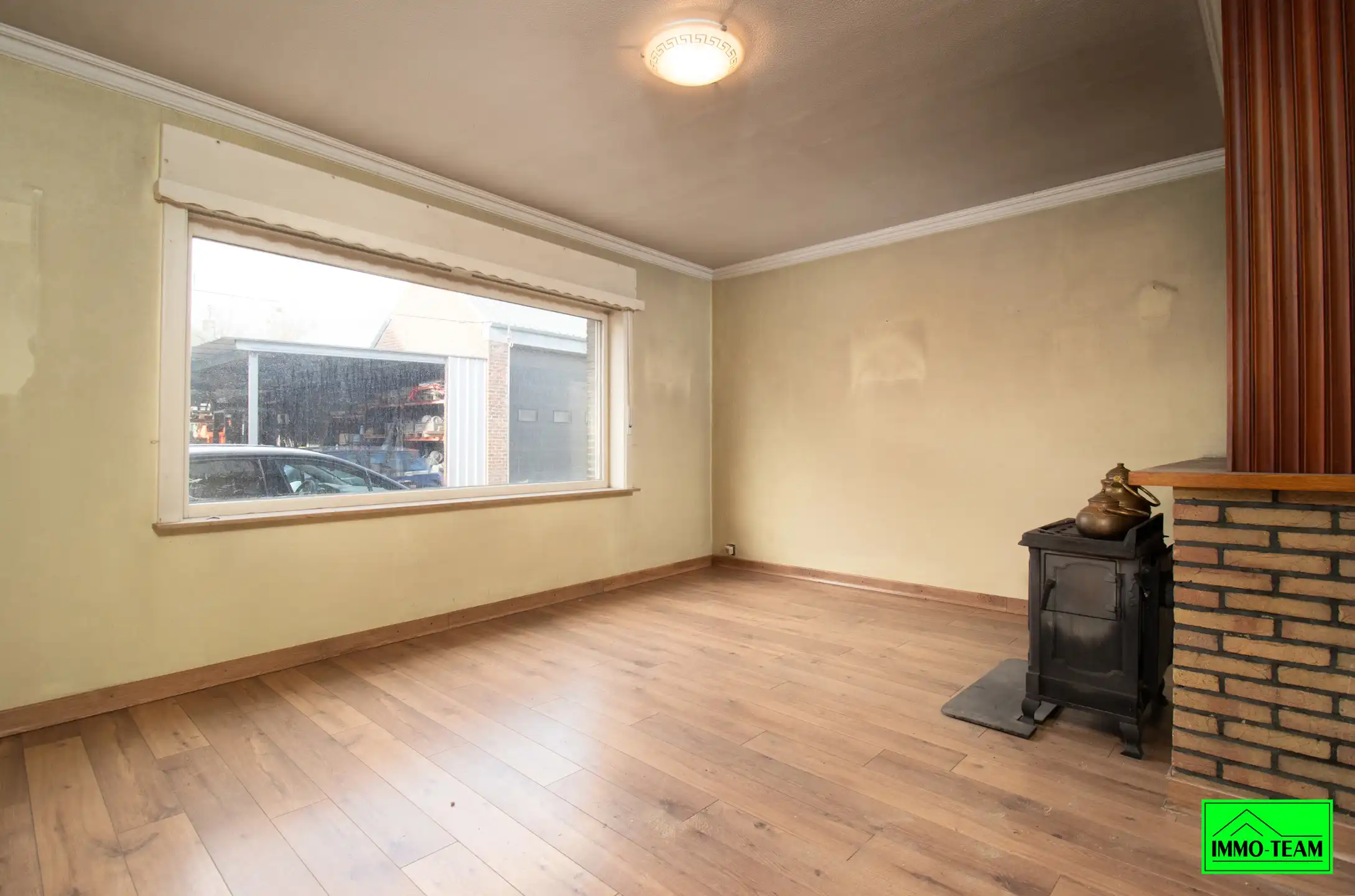 Te renoveren 4-gevel woning met garage en tuin foto 4