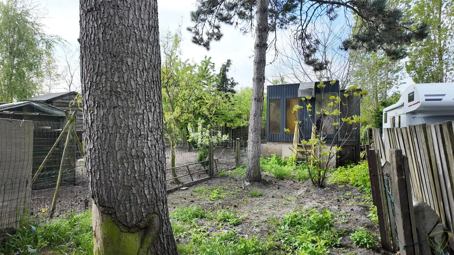 Charmante gesloten bebouwing met ruime tuin en renovatiepotentieel foto 22