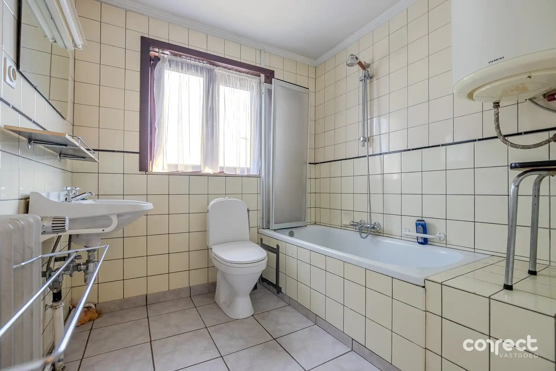 Op te frissen woning op ruim perceel van 857 m². foto 5
