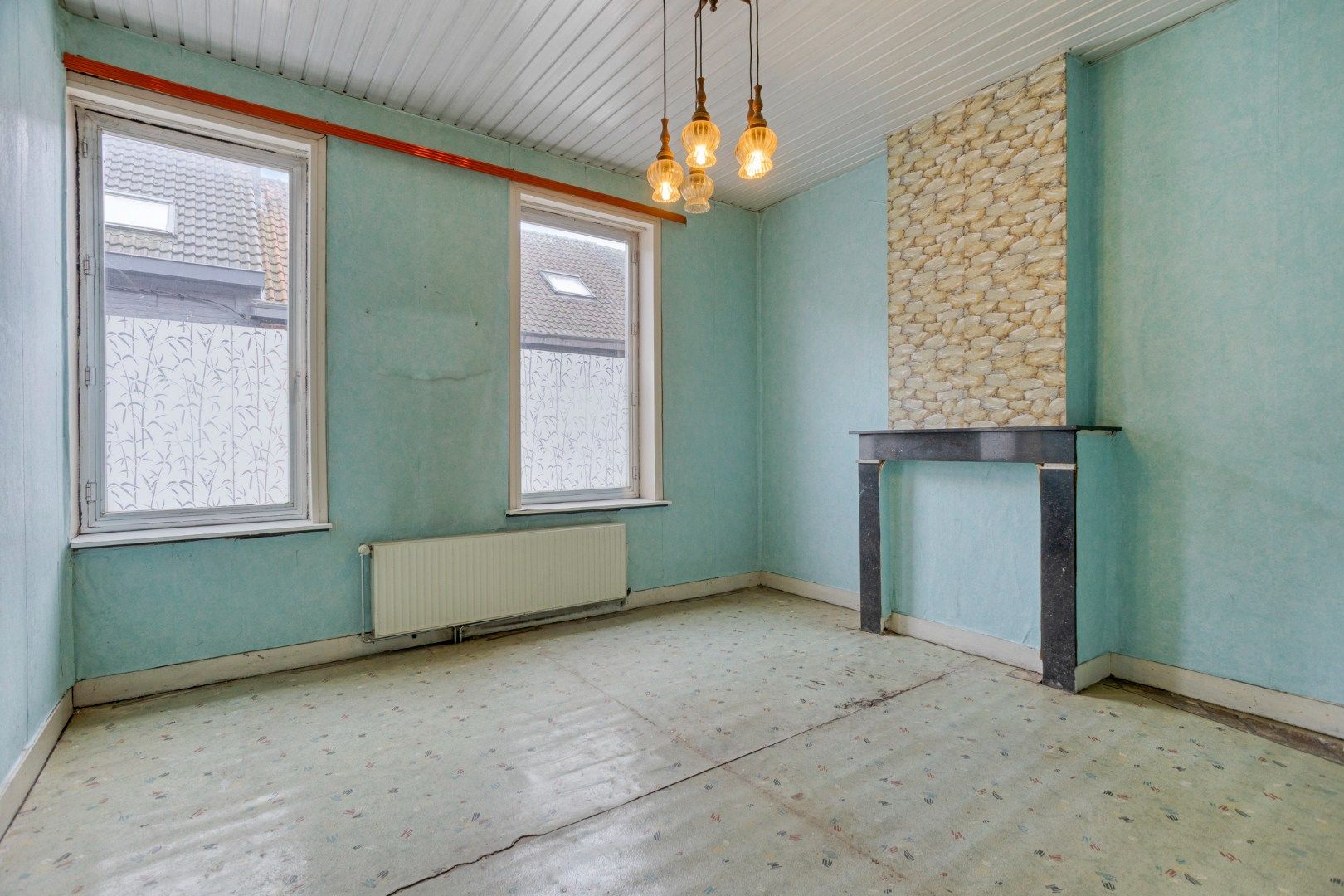 Goedgelegen rijwoning foto 6