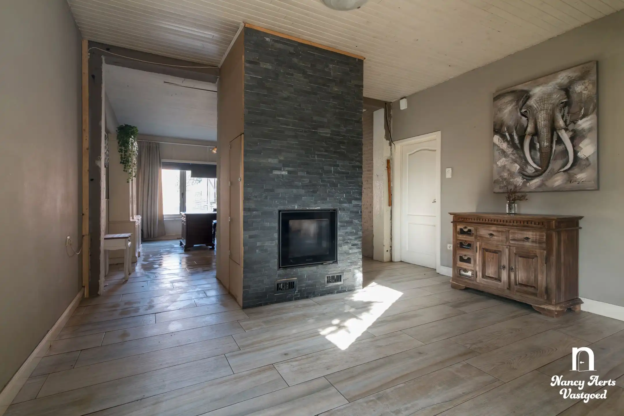 Ruime halfopen woning met tuin en veel potentieel foto 11