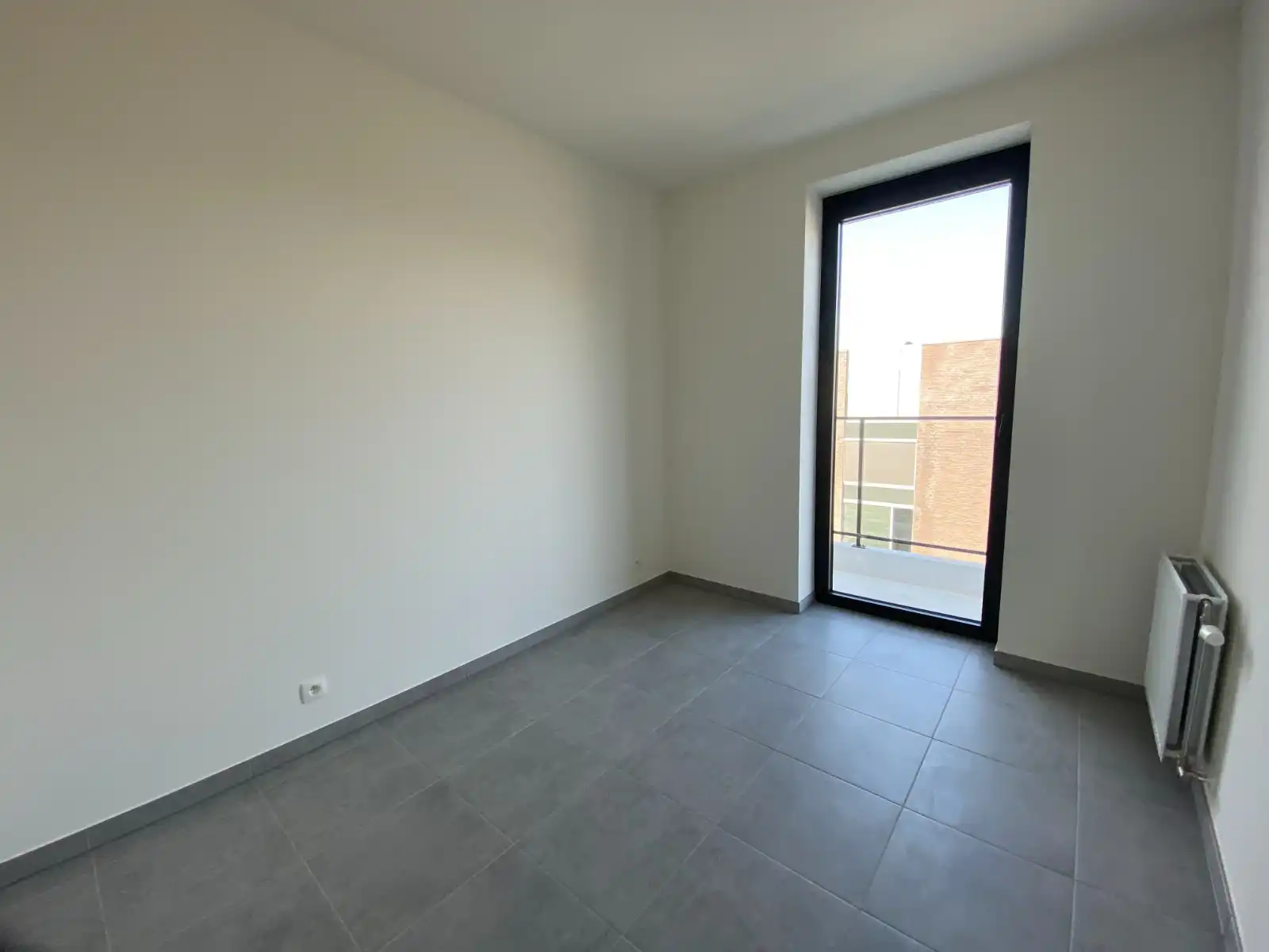 STIJLVOL NIEUWBOUWAPPARTEMENT MET 2 SLAAPKAMERS EN ZONNETERRASSEN – TOPLIGGING IN WAREGEM foto 12