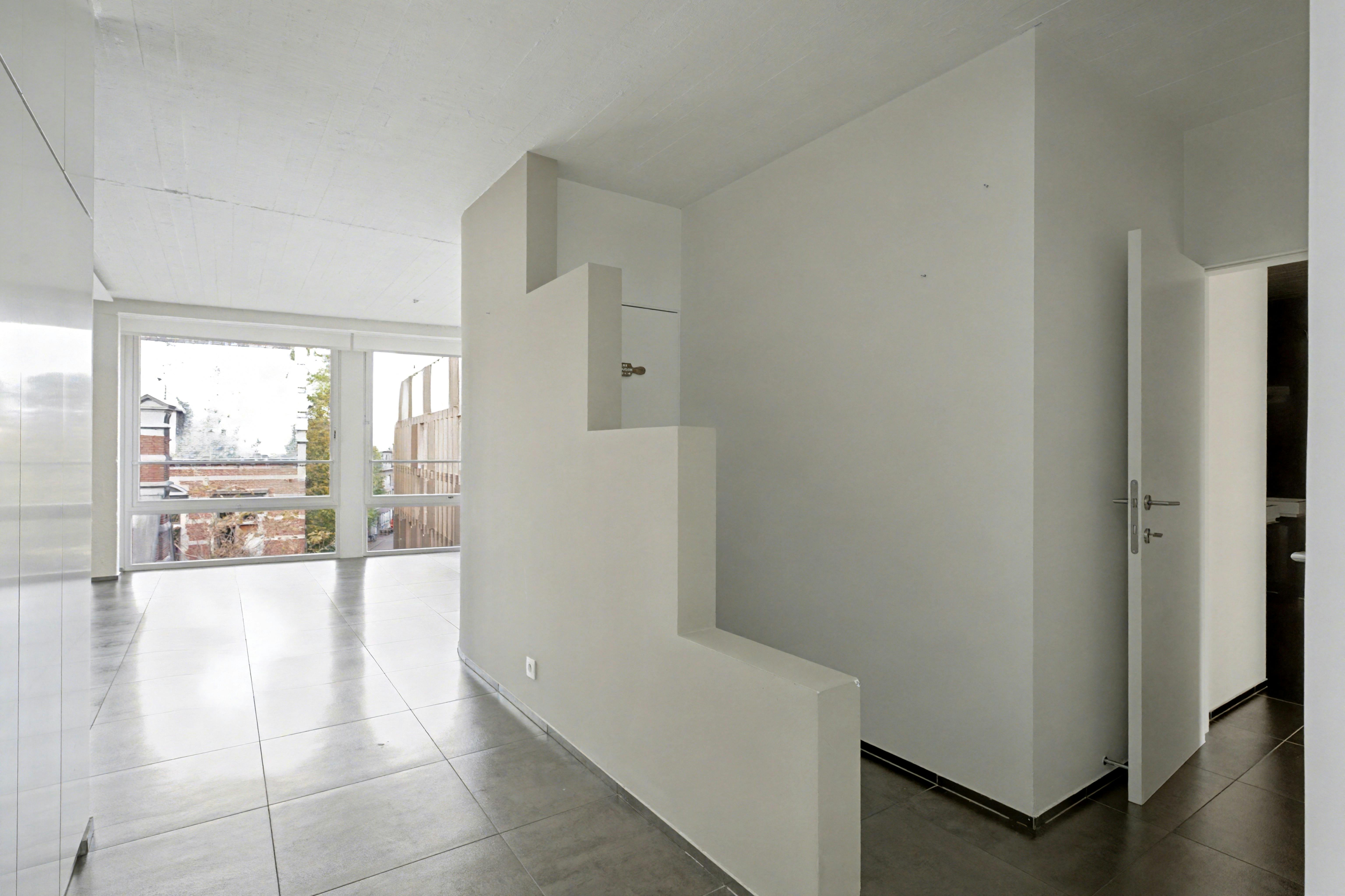 Exclusief duplex-penthouse met adembenemend terras in hartje Hasselt foto 17