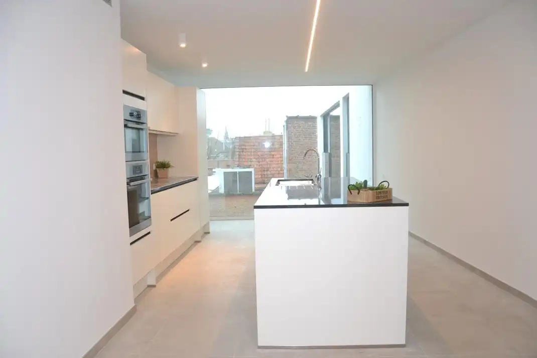 Luxe-appartement met 2 slaapkamers nabij de Grote Markt! foto 2