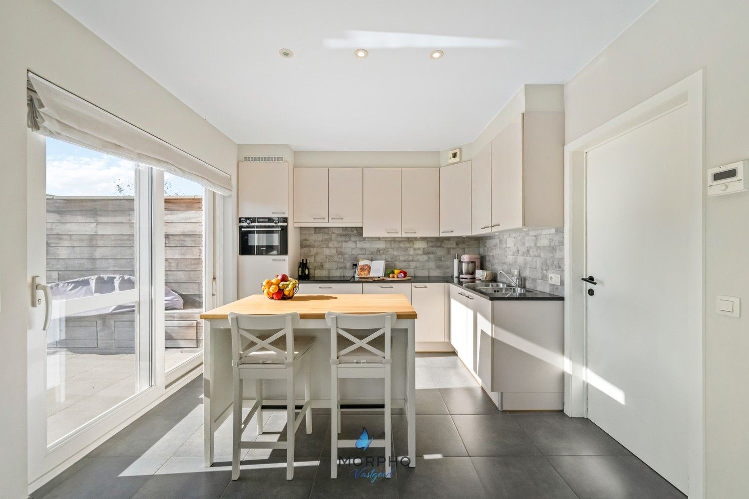 Instapklare energiezuinige gezinswoning met 3 slaapkamers, ruime zolder en tuin in Assebroek foto 2