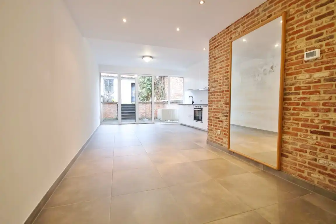 Gunstig gelegen gelijkvloers duplex appartement nabij de Grote Markt foto 5