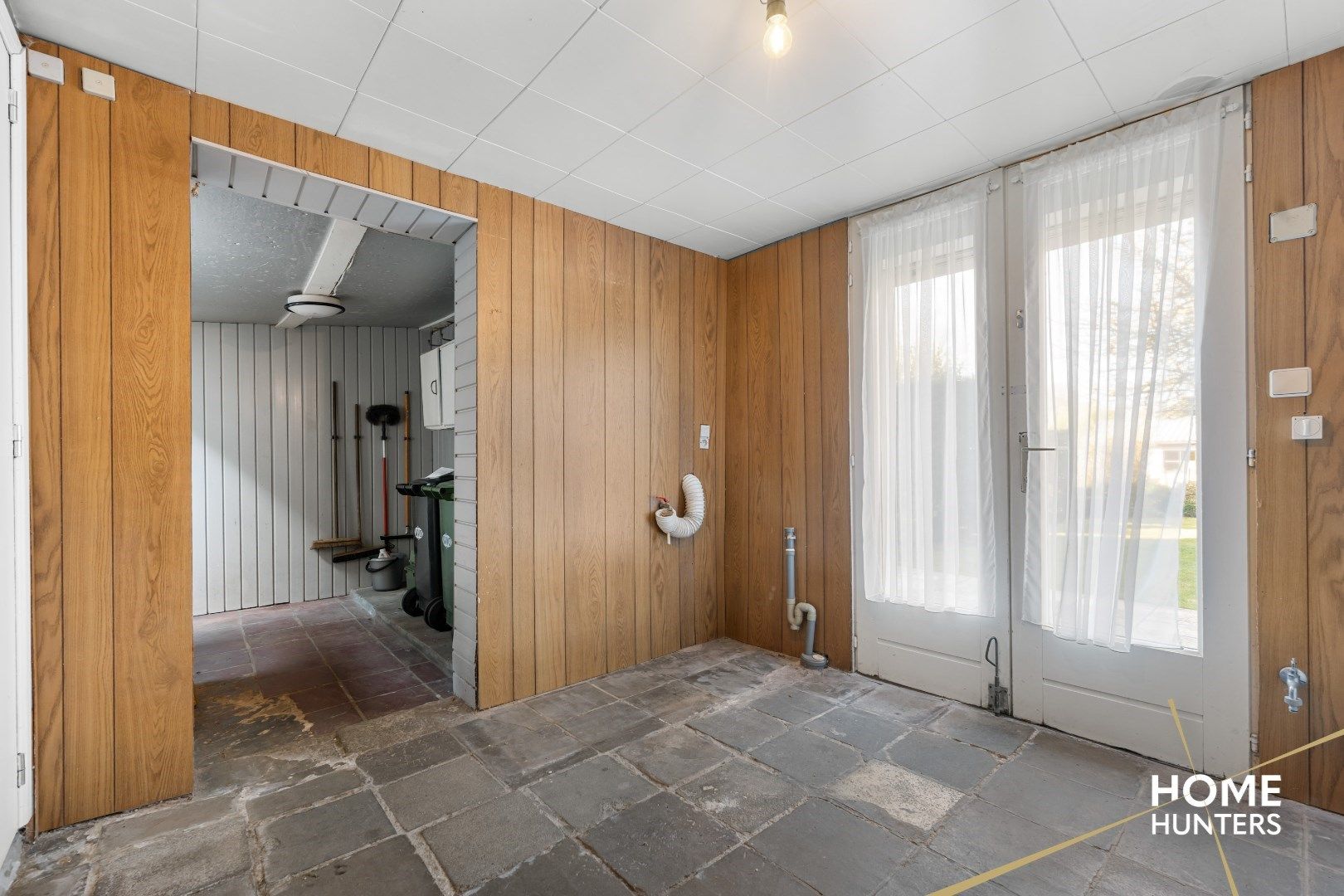 Authentiek herenhuis in Mesen – een renovatieparel met potentieel foto 9