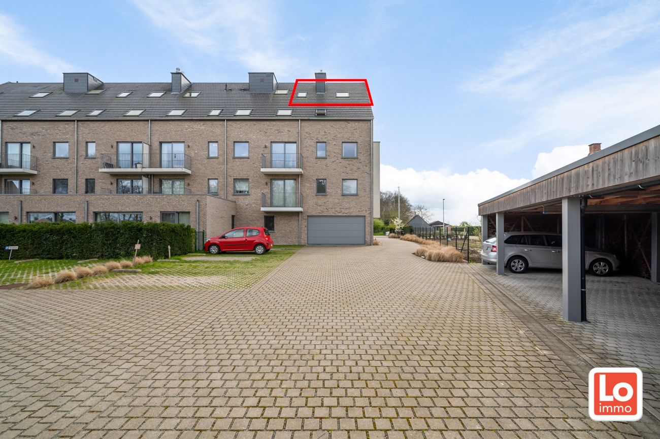 VERKOCHT! Modern 1-slaapkamer appartement met zuidgericht terras en overdekte autostaanplaats in hartje Zeveneken! foto 15