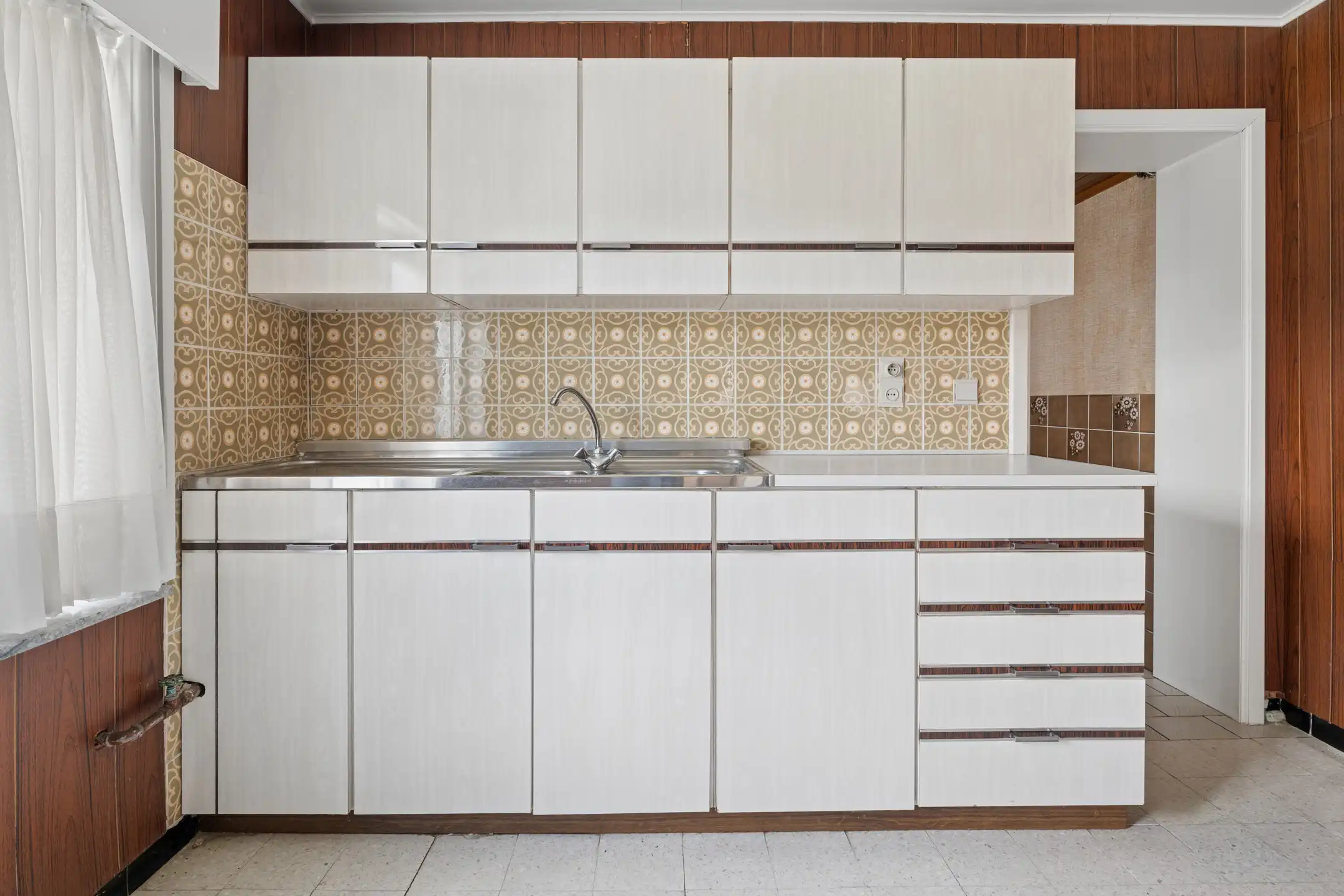 Te renoveren 3-gevelwoning in rustige doodlopende straat  foto 7