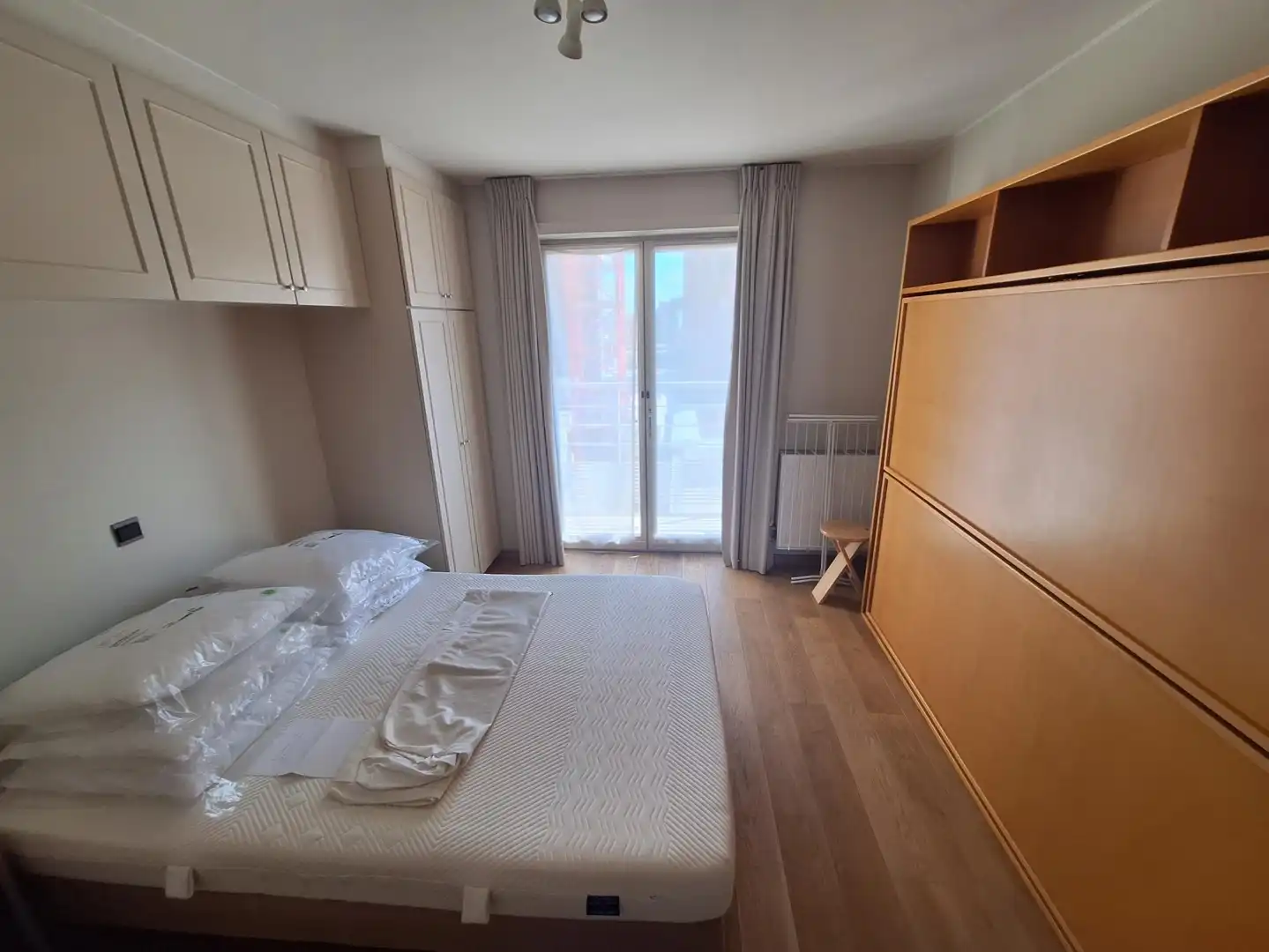 Licht gemeubelde appartement met één slaapkamer foto 13