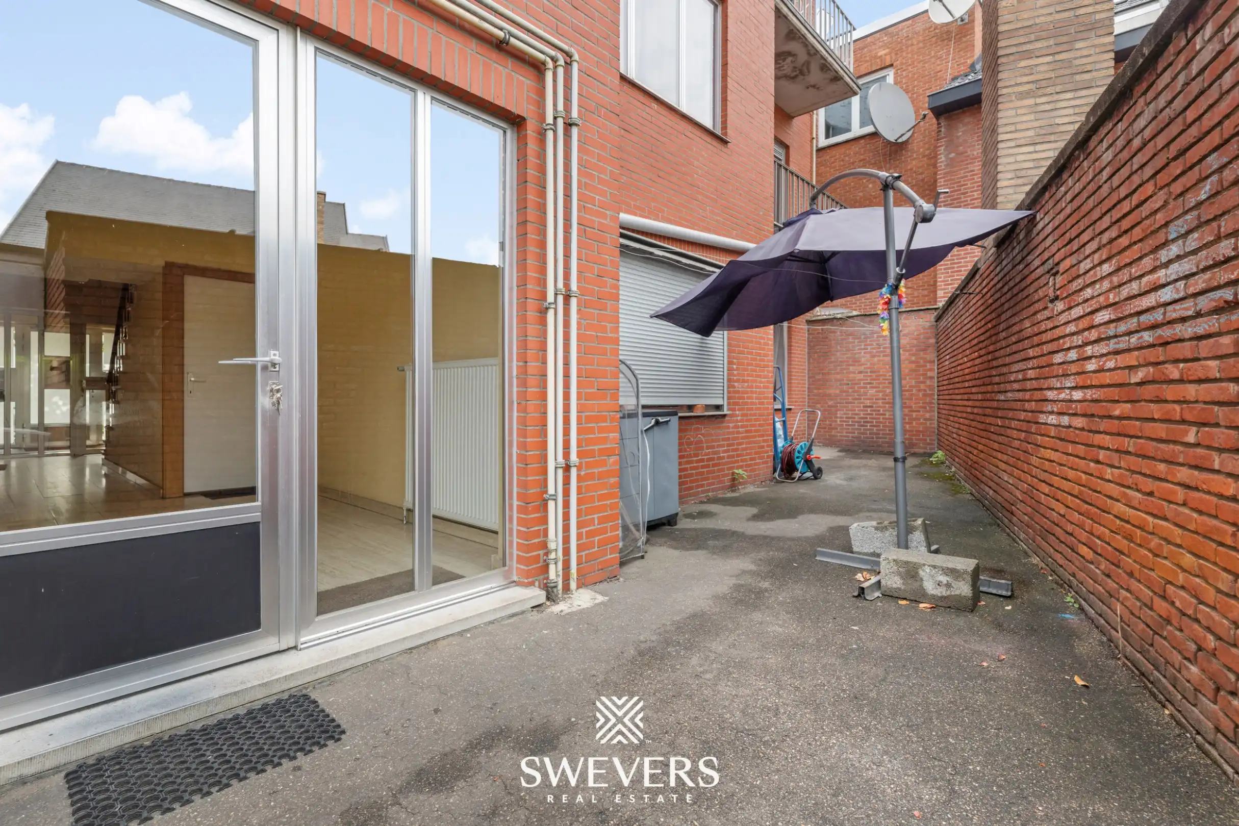Gelijkvloers appartement met 2 slaapkamers en garagebox in centrum Beringen foto 17