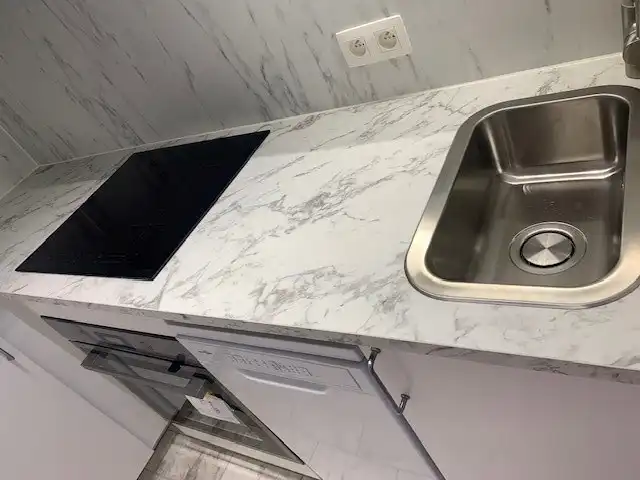 Volledig gerenoveerde studio met zicht op zee! foto 11