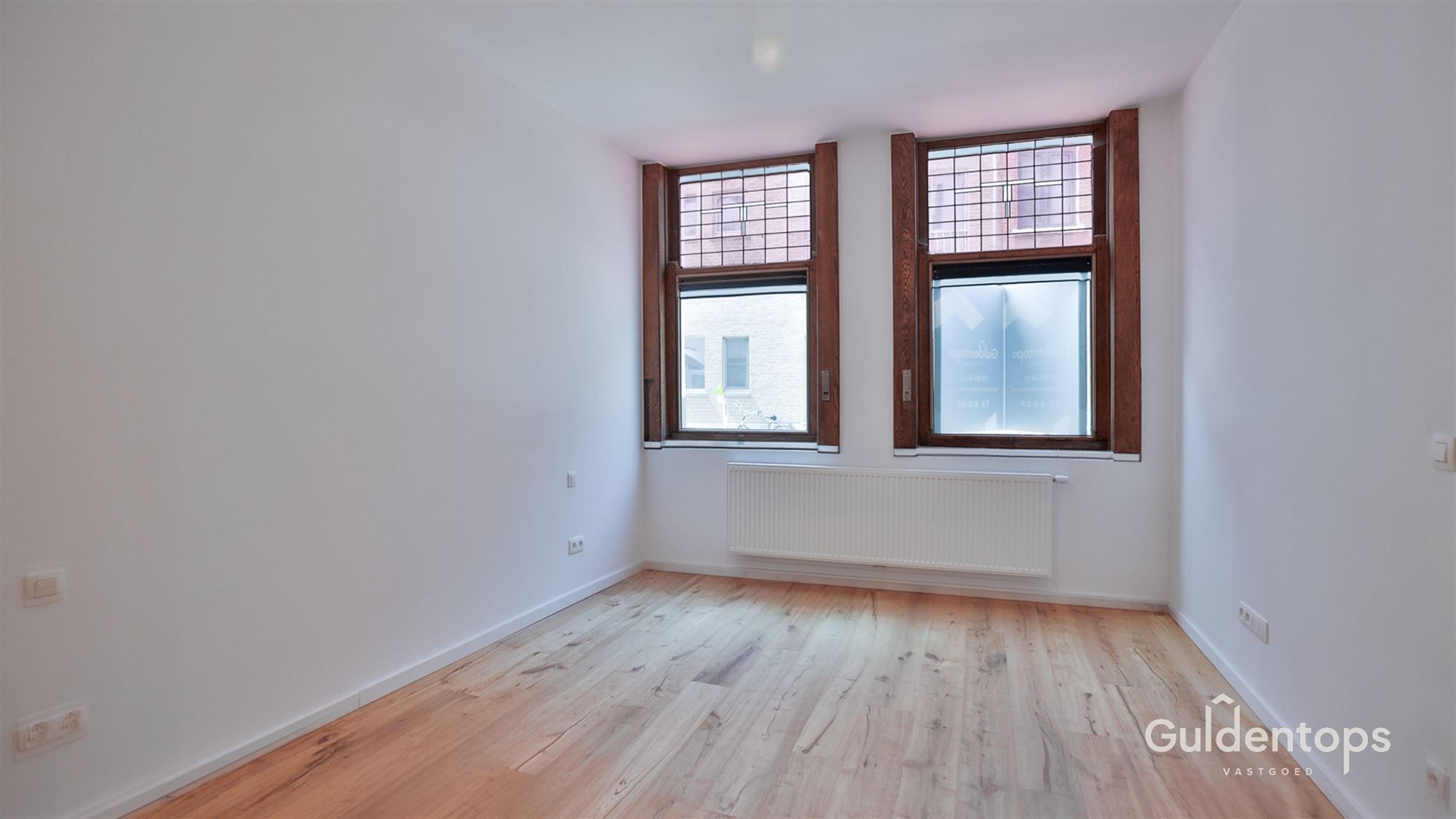 Knap gelijkvloers appartement in hartje Lier met grote tuin foto 9